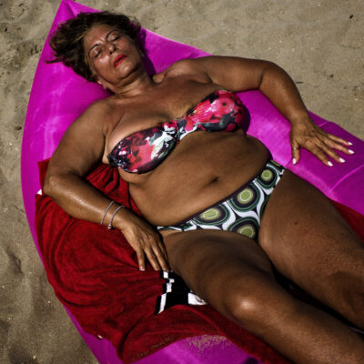 01-italian-summer-sea-beach-sun-italy-sicily puglia-holidays--tanning-swimwear-pink-woman-nap-pattern