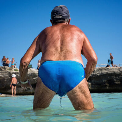 07-italian-summer-sea-beach-sun-italy-sicily puglia-holidays--tanning-swimwear-blue-water-game-paddle-rocks