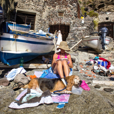 09 italian summer sea beach sun italy sicily puglia holdays woman swimwear dog hat
