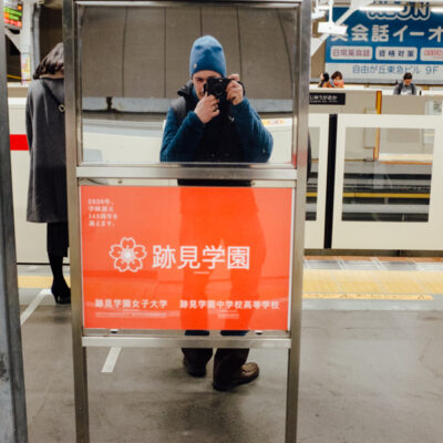 After walking the streets of Tokyo for more than 10 hours, I finally got the last train, and this image of me represents precisely the pain I had on my feet.