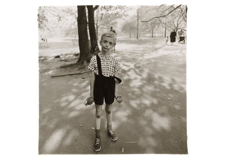 Child with toy hand grenade in Central Park of the New York capture by Diane Arbus