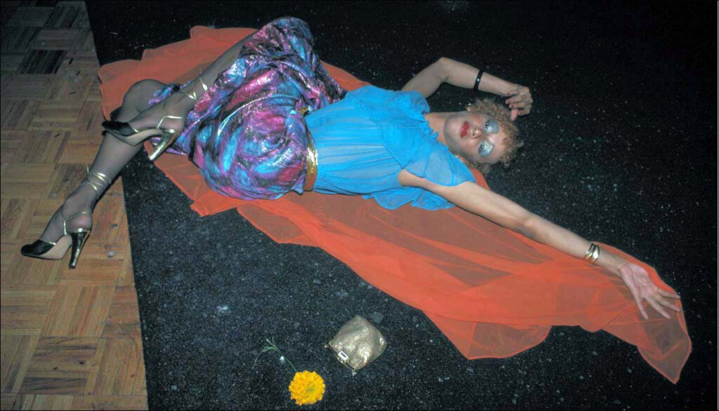Orange, Pink, Turquoise, and Gold Queen on Floor Studio 54, NY, NY, August 1977
